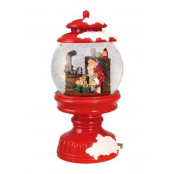 Snowglobe in a lantern shows Santa and his Elves baking